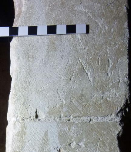 11. Inverted V V or W. Tower doorway ground floor.