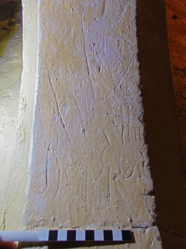 7. Name, possibly Wylliam Heydjon, with cross above. Ringing chamber doorway.