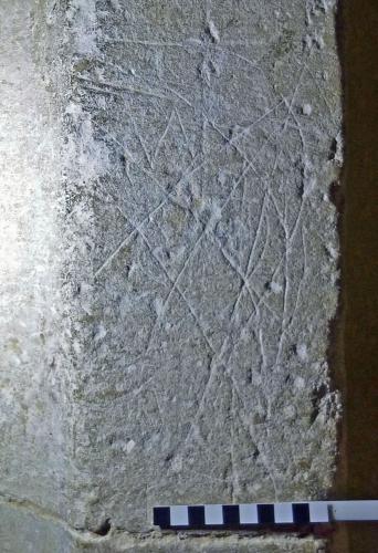 9. Grid or net & letter W. Ringing chamber doorway.