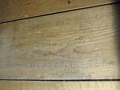Ipplepen 15. Tower, clock door. 1941 record of clock maintenance, by TA Hampson. 
