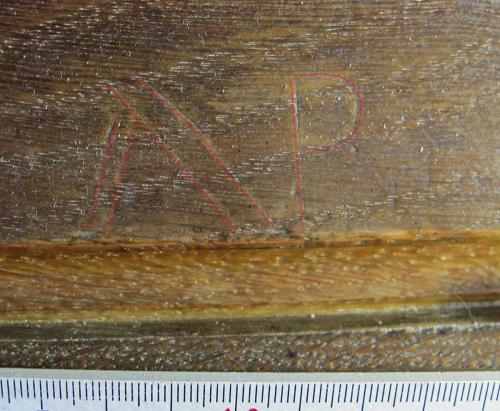Ipplepen 8. Rood Screen. Letters M P, outlined in red. The M form is suggestive of an apotropaic mark. 