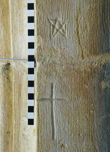 1. Pentangle and cross. South doorway.