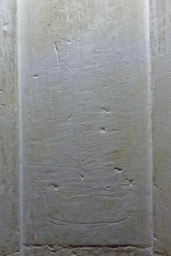 1. Ship, with arrow above. Tower N. archway.