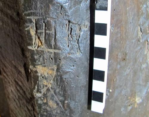 10. ?Framed cross or crossed letter I, and other mark. Scored saltire cross below. Tower Ladder