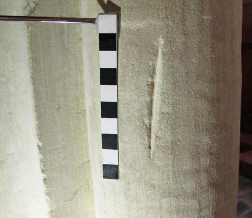 2. Deep score mark, possibly deliberate. North aisle pier.