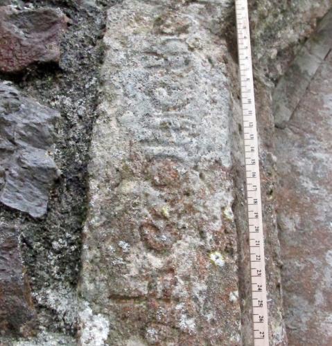 2. Part of Biblical inscription around porch.