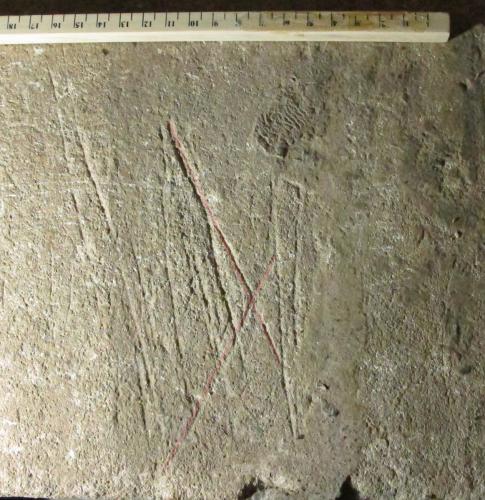 3. Partial saltire cross or butterfly symbol. North porch bench.