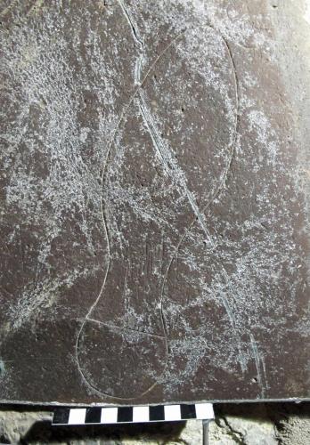 4. Shoe outline, feint initials. Lead.