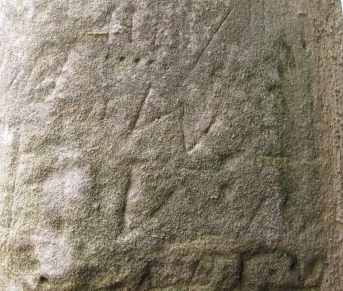 6. W with V below.  External tower doorway.