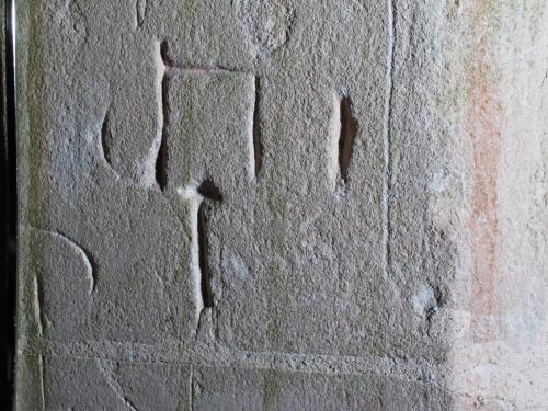 6. ?Symbol & letters. South doorway. 