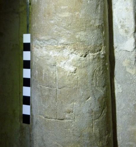 8. Cross or crossed letter I  & letter S. Tower W. archway. 