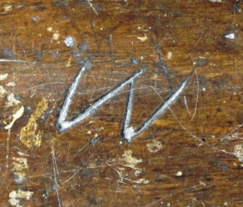 3. Lone letter W. South aisle bench.
