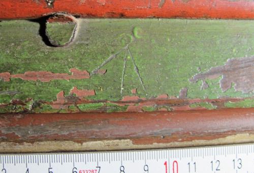 11. Chancel screen. Arrow type mark. Probably apotropaic. 