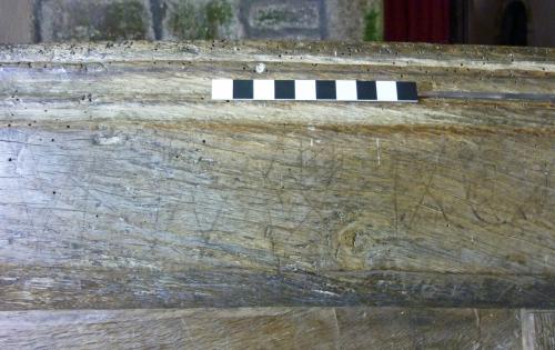 Bondleigh 13. S. row bench. W's & ?butterfly symbol. 