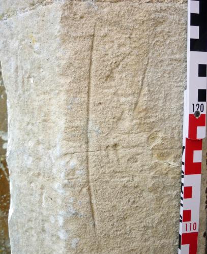 Bondleigh 8. Priests' doorway. Score mark  & triangular mark.