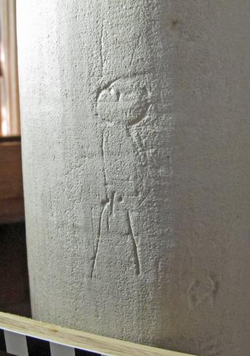 Broadhempston 5. Pier. Male stick figure.