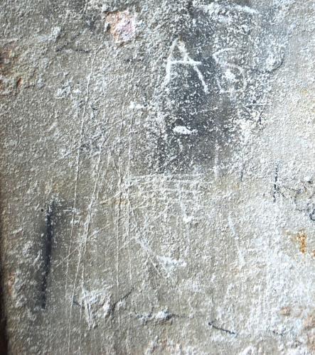 5. Multiple crossed lines, including inverted V shapes. Also A S -  probable initials. Tower, N. doorway