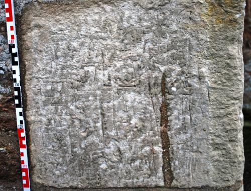8. Multiple marks including possible letters & dates. Exterior SW corner. 