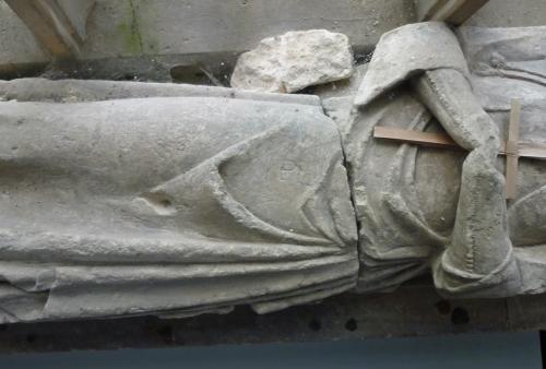 10. Graffiti on the female effigy.