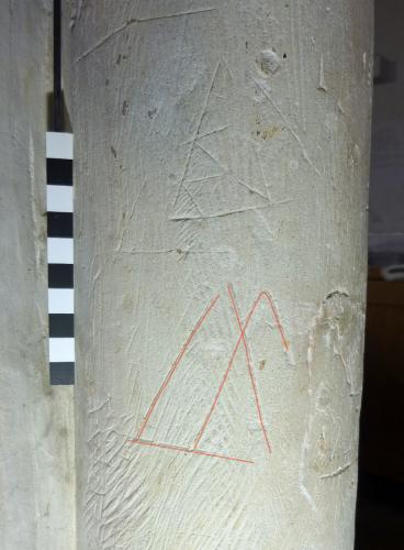 3. M-type symbol (red highlight) with triangular features above. South arcade pier.
