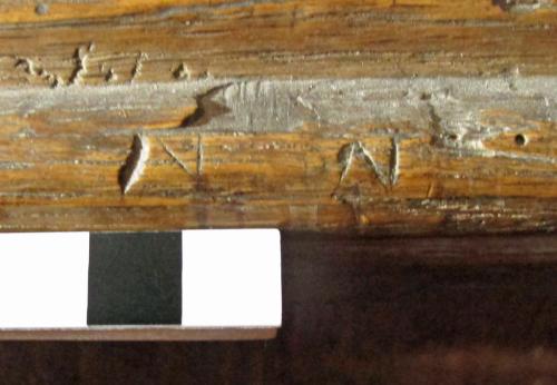 6. Letter N or IV, on parclose screen.