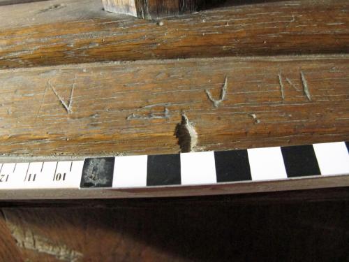 7. Letter N and other mark, on parclose screen.