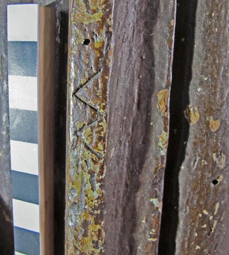 2. N. chapel screen. V V or W on its side, probably apotropaic. 