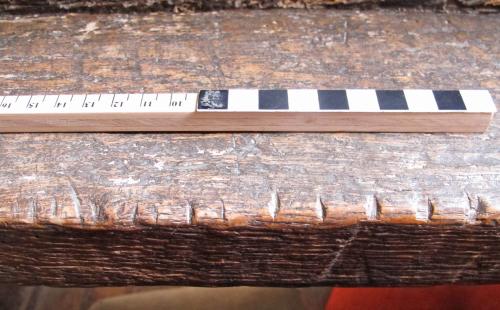 8. S. aisle bench. Series of notches.