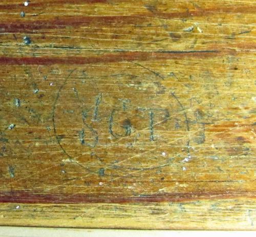 3. Initials S.G.T on bench.