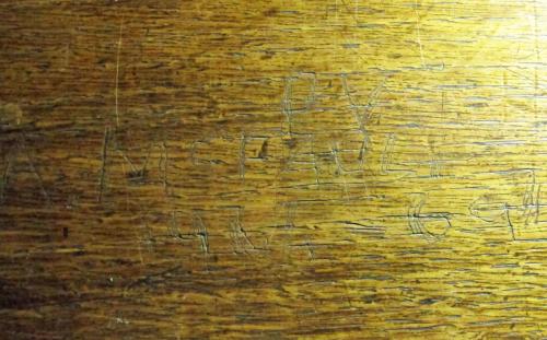 5. Name A. McFaul and dates 1964-69, on choir stall.